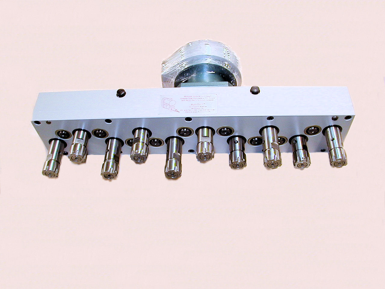 Staggered Spindles and Staggered Pattern Multi-Drill Head